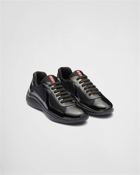 prada shoes black shiny|Prada black slip on shoes.